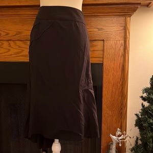 Knee-length Black skirt plain front, pleated back Size 16 #10155